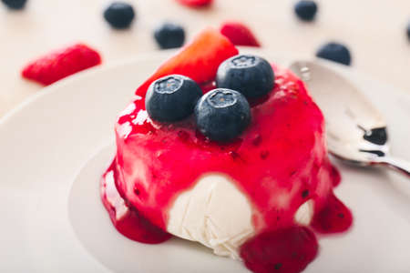 Tasty panna cotta on plate, closeupの写真素材