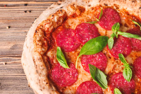 Tasty pizza on wooden table, closeupの写真素材