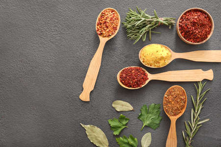 Different spices on dark backgroundの写真素材