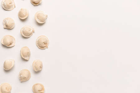 Fresh raw dumplings on white backgroundの写真素材