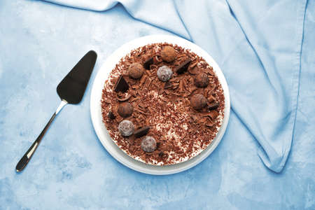 Tasty chocolate cheesecake on color backgroundの写真素材