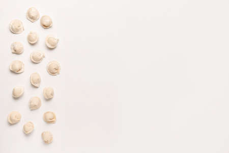 Fresh raw dumplings on white backgroundの写真素材