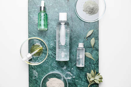 Composition with cosmetics for hair on white backgroundの写真素材