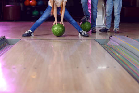 Little children playing bowling in clubの写真素材