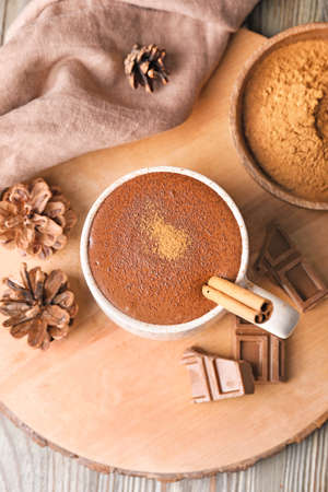 Cup of hot chocolate on wooden tableの写真素材