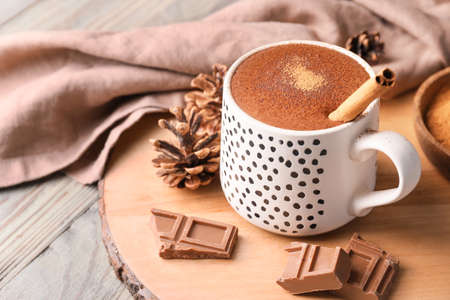 Cup of hot chocolate on wooden tableの写真素材