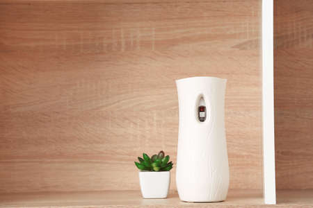 Modern air freshener on shelfの写真素材