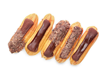 Tasty chocolate eclairs on white backgroundの写真素材
