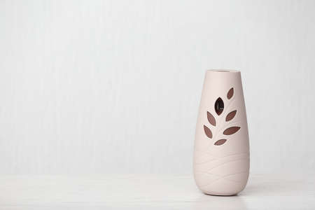 Modern air freshener on light backgroundの写真素材