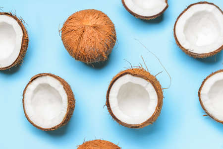 Tasty coconuts on color backgroundの写真素材