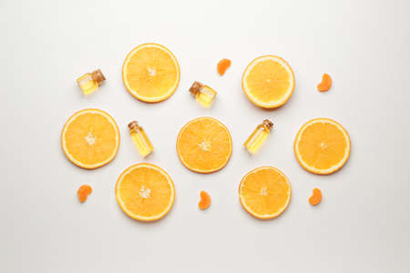 Composition with citrus essential oils on white backgroundの写真素材