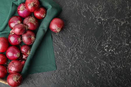 Fresh raw onion on dark backgroundの写真素材