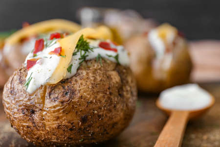 Tasty baked potato with sour cream, closeupの写真素材