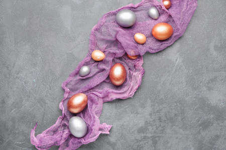 Beautiful Easter eggs on gray background