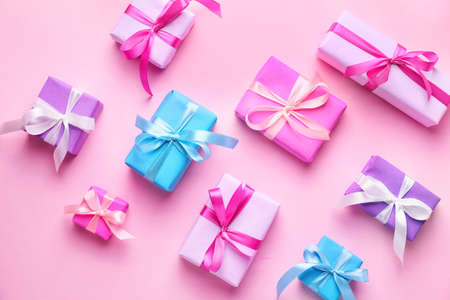 Many Birthday gifts on color backgroundの写真素材