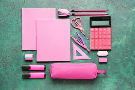 Pencil bag with stationery on color backgroundの写真素材