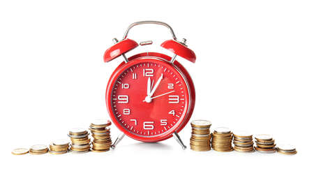 Alarm clock and coins on white background. Time management conceptの写真素材