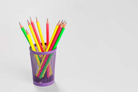 Holder with pencils on light backgroundの写真素材