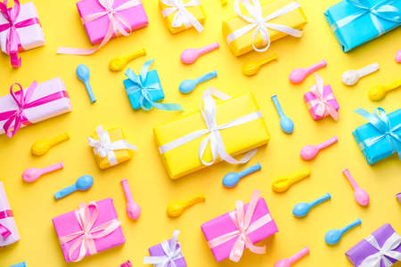 Many Birthday gifts and decor on color backgroundの写真素材