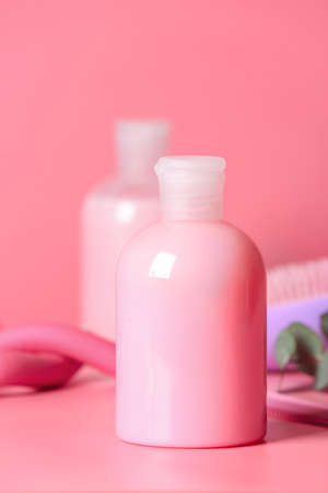 Bottle of shampoo on color backgroundの写真素材
