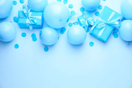 Many Birthday gifts and decor on color backgroundの写真素材