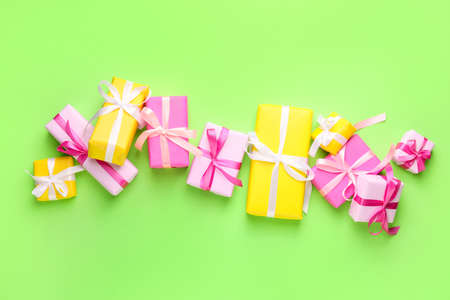 Many Birthday gifts on color backgroundの写真素材