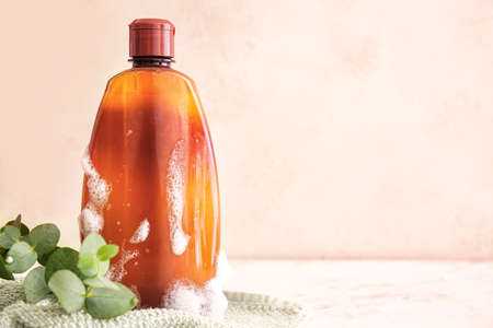 Shampoo with herbal extract on tableの写真素材