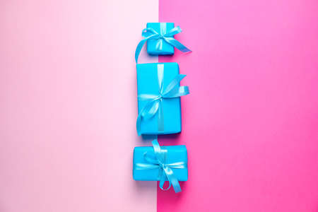 Birthday gifts on color backgroundの写真素材