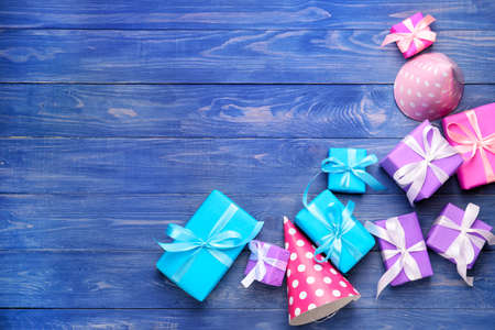 Many Birthday gifts on wooden backgroundの写真素材