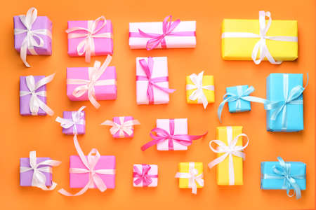 Many Birthday gifts on color backgroundの写真素材
