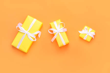 Birthday gifts on color backgroundの写真素材