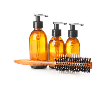 Shampoo and brush on white backgroundの写真素材