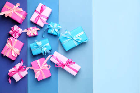 Many Birthday gifts on color backgroundの写真素材