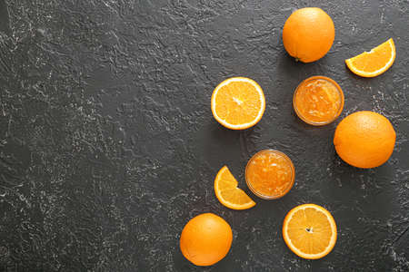 Jars of orange jam on dark backgroundの写真素材