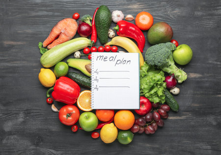 Healthy products and meal plan on dark backgroundの写真素材
