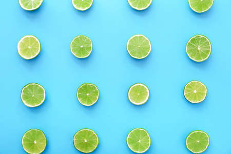 Fresh limes on color backgroundの写真素材