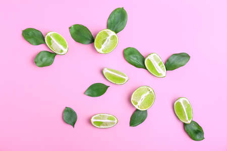 Fresh limes on color backgroundの写真素材