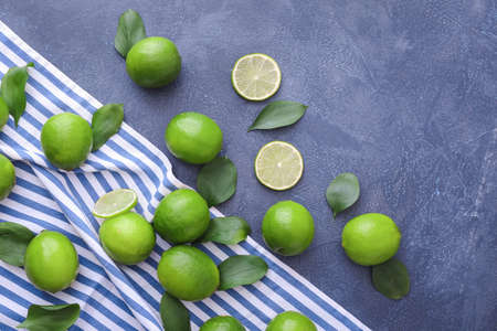 Fresh limes on color backgroundの写真素材