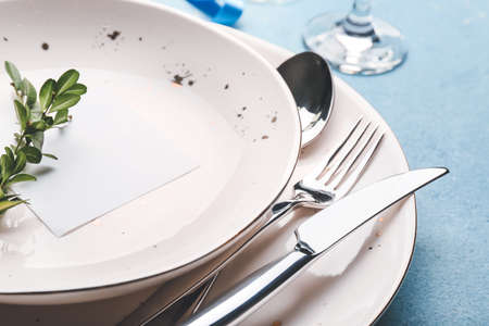 Beautiful table setting with floral decor, closeupの写真素材