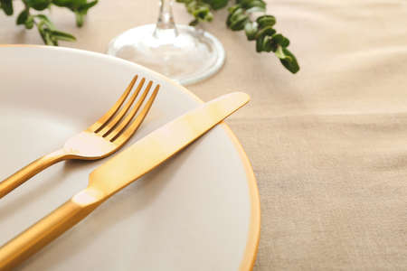 Beautiful table setting with floral decor, closeupの写真素材