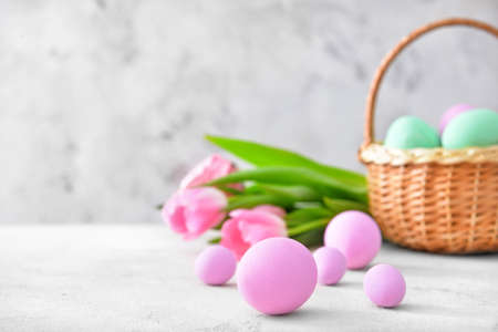 Beautiful Easter eggs on light backgroundの写真素材