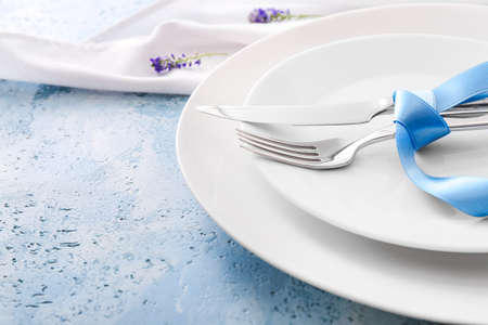 Beautiful table setting with floral decor, closeupの写真素材