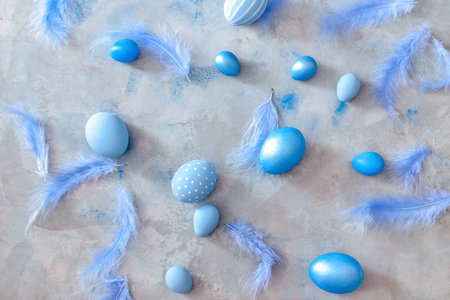 Beautiful Easter eggs on color backgroundの写真素材