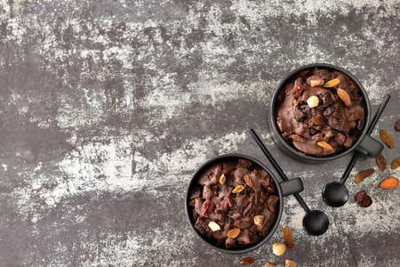 Chocolate mug cakes on dark backgroundの写真素材