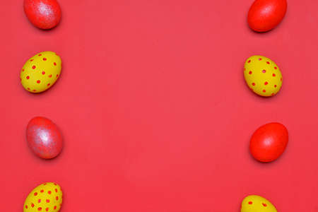 Beautiful Easter eggs on color backgroundの写真素材
