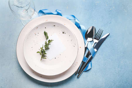 Beautiful table setting with floral decorの写真素材