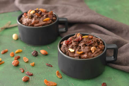 Chocolate mug cakes on color backgroundの写真素材