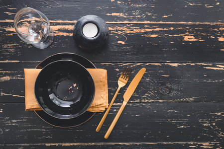 Beautiful table setting on dark wooden backgroundの写真素材