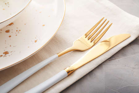 Beautiful table setting on gray background, closeupの写真素材