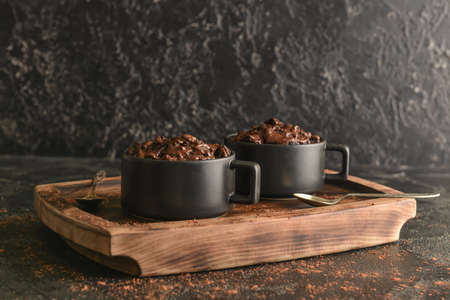 Chocolate mug cakes on dark backgroundの写真素材